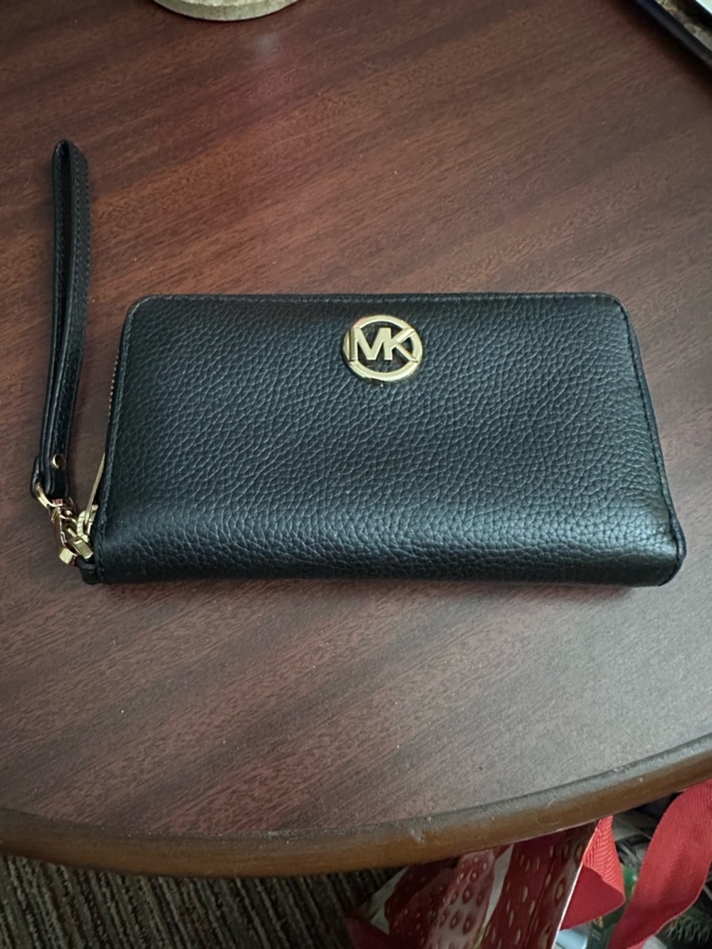 Micheal Kors black wristlet.